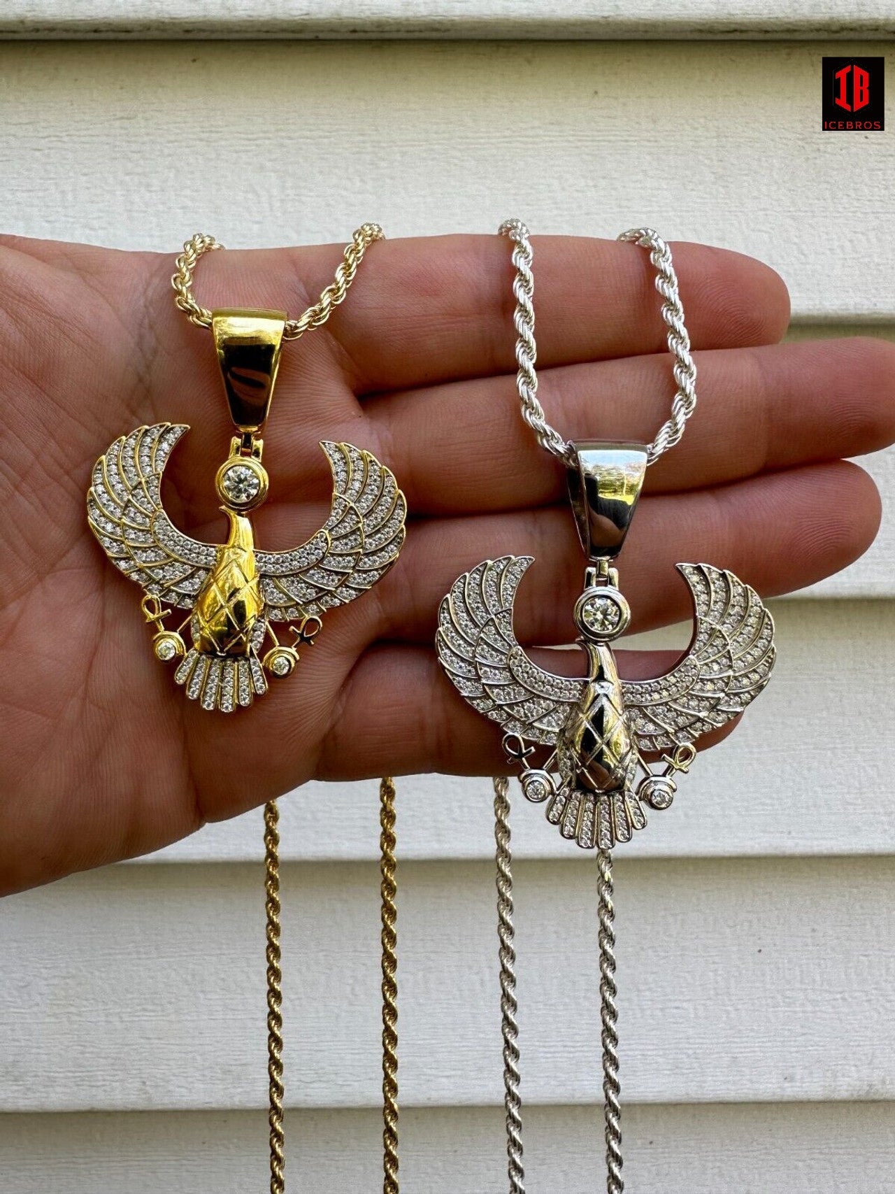 Hand Model Showing 14k White Gold or 14k Yellow Gold VVS Moissanite  Horus Wing Pendant 925 Sterling Silver Necklace