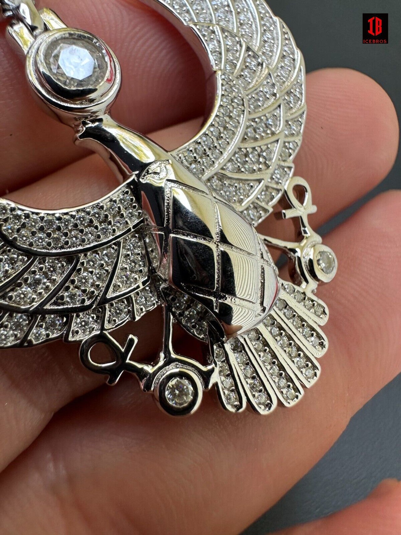 A Detailed View of 14k White Gold Moissanite Horus Falcon Wing Pendant Necklace