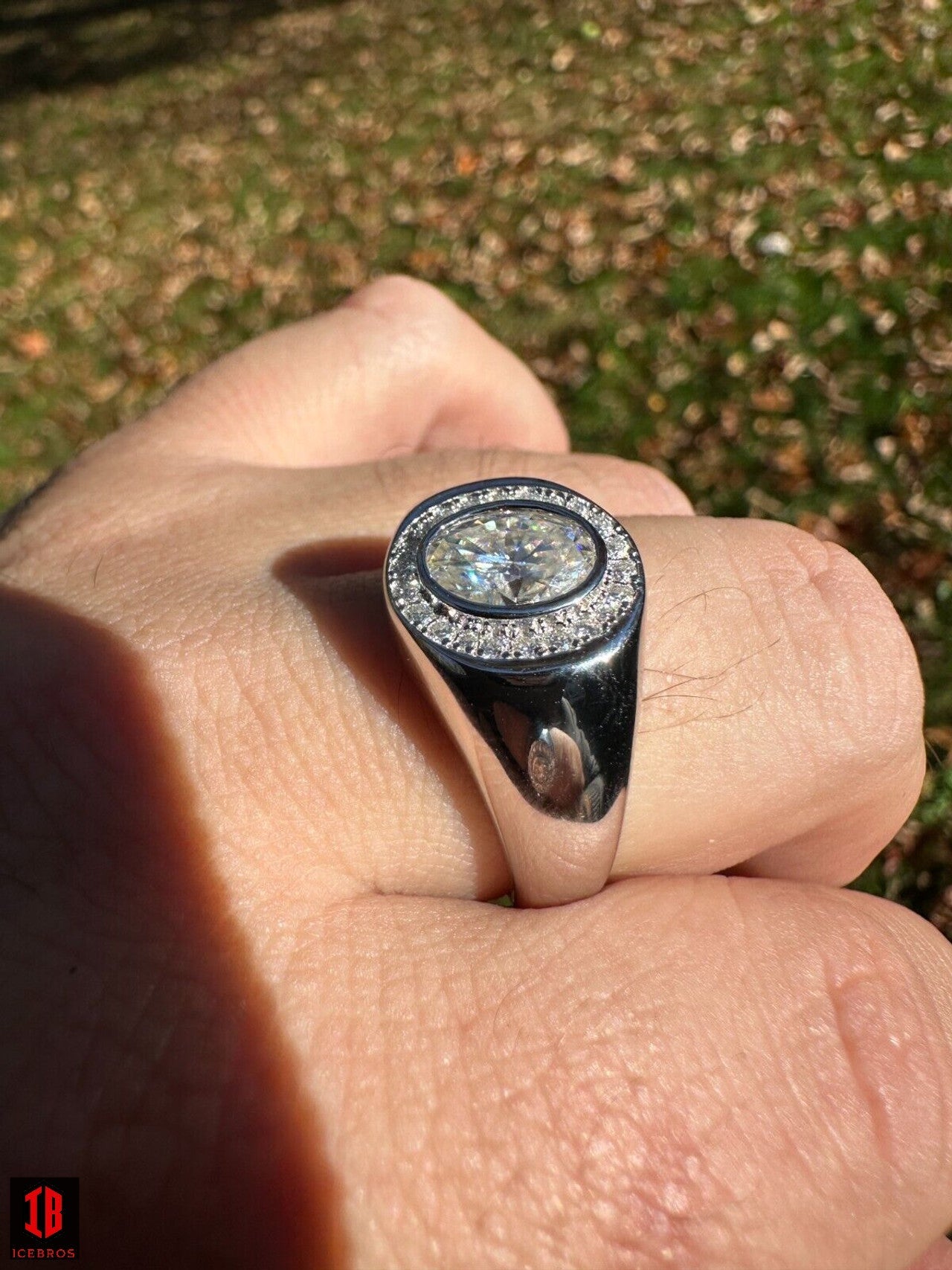 White gold engagement ring with Moissanite Diamond in Hand .