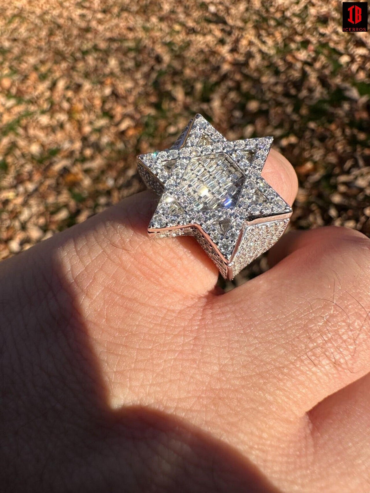 a Man wearing Magen Star of David  VVs1 Baguette Moissanite  Ring