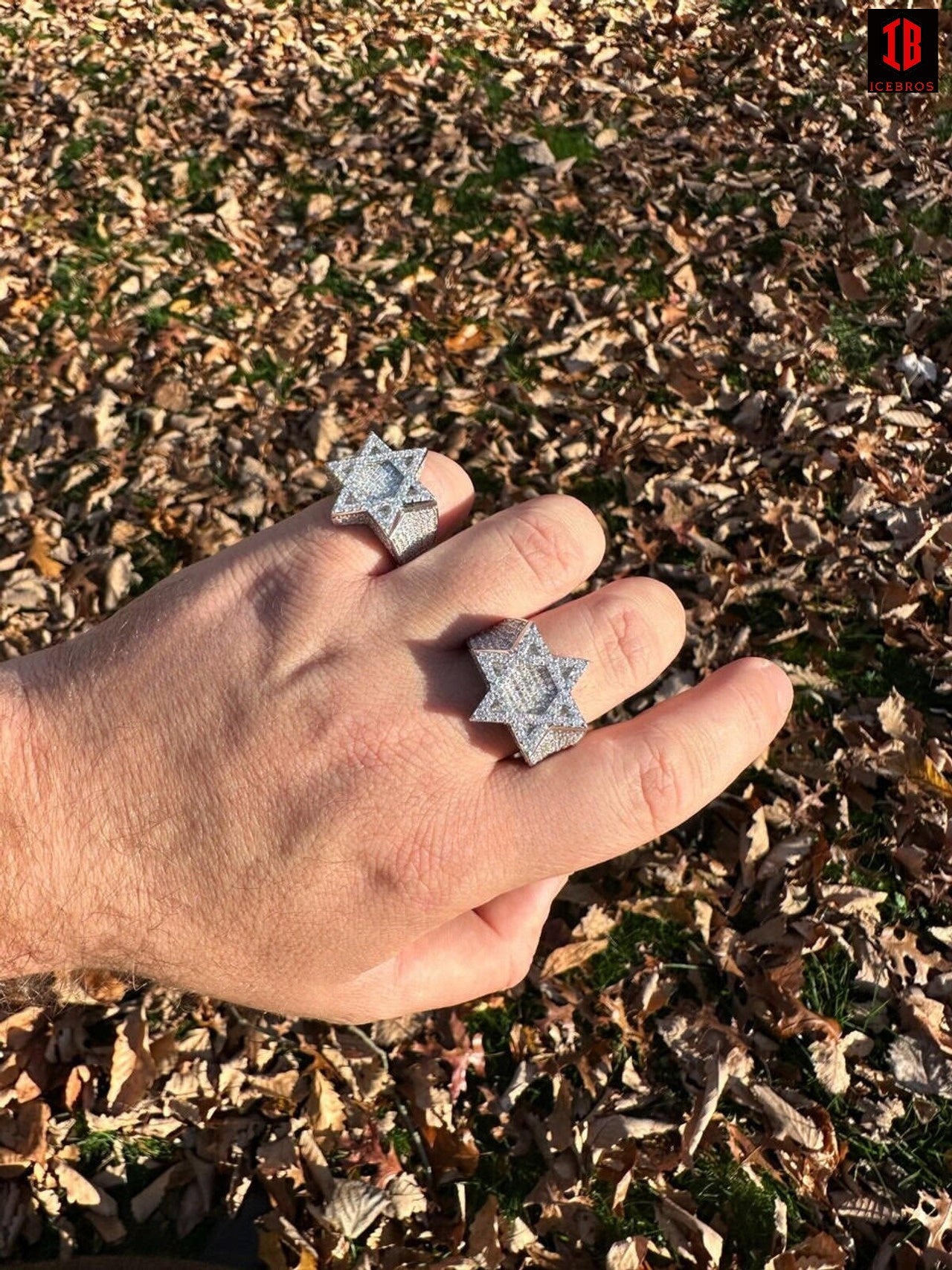 zoom out Complete view of White Gold Star of David  Ring  in A person Hand