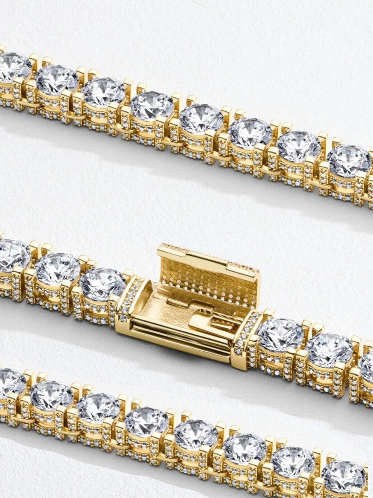 5mm 18k yellow gold Moissanite Diamond Tennis Chain Necklace with a sleek clasp. The chain shimmers with brilliant Moissanite diamonds set in a row, creating a stunning and elegant piece of jewelry