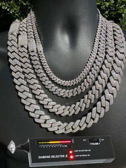 White Gold Cuban Link Chain Being Tested with a Diamond Tester for Authenticity