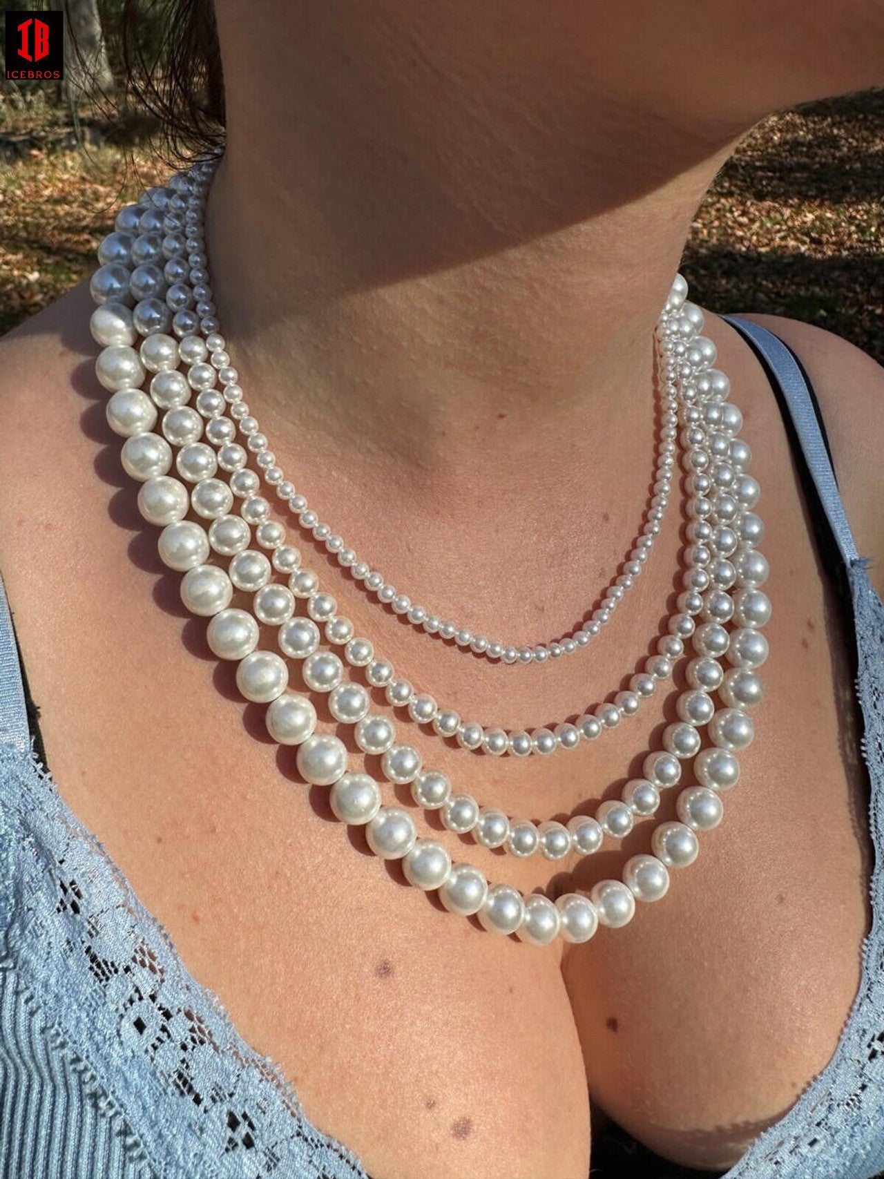 A Women wearing VIntage Pearl chain necklace