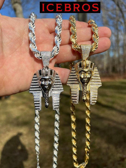 A Person Showing 14k Gold and 14k White Gold King Tut Pharaoh Necklace With Twisted Rope Chains 