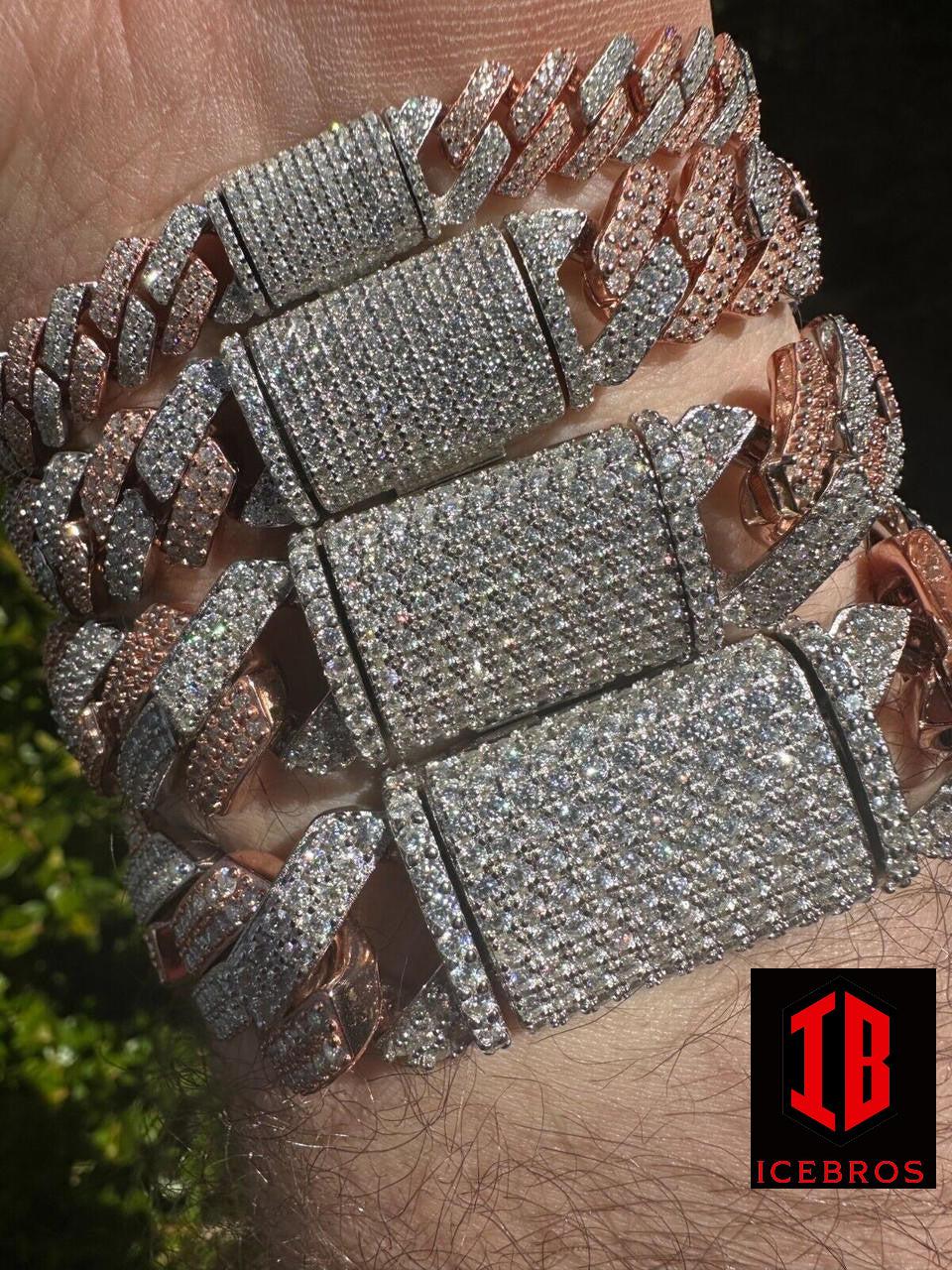 Close-up image of a 14k Rose & White Gold Diamond Moissanite Miami Cuban Link Bracelet. The focus is on the intricate Buckle Clasp of the bracelet, showcasing its detailed design and secure fastening mechanism