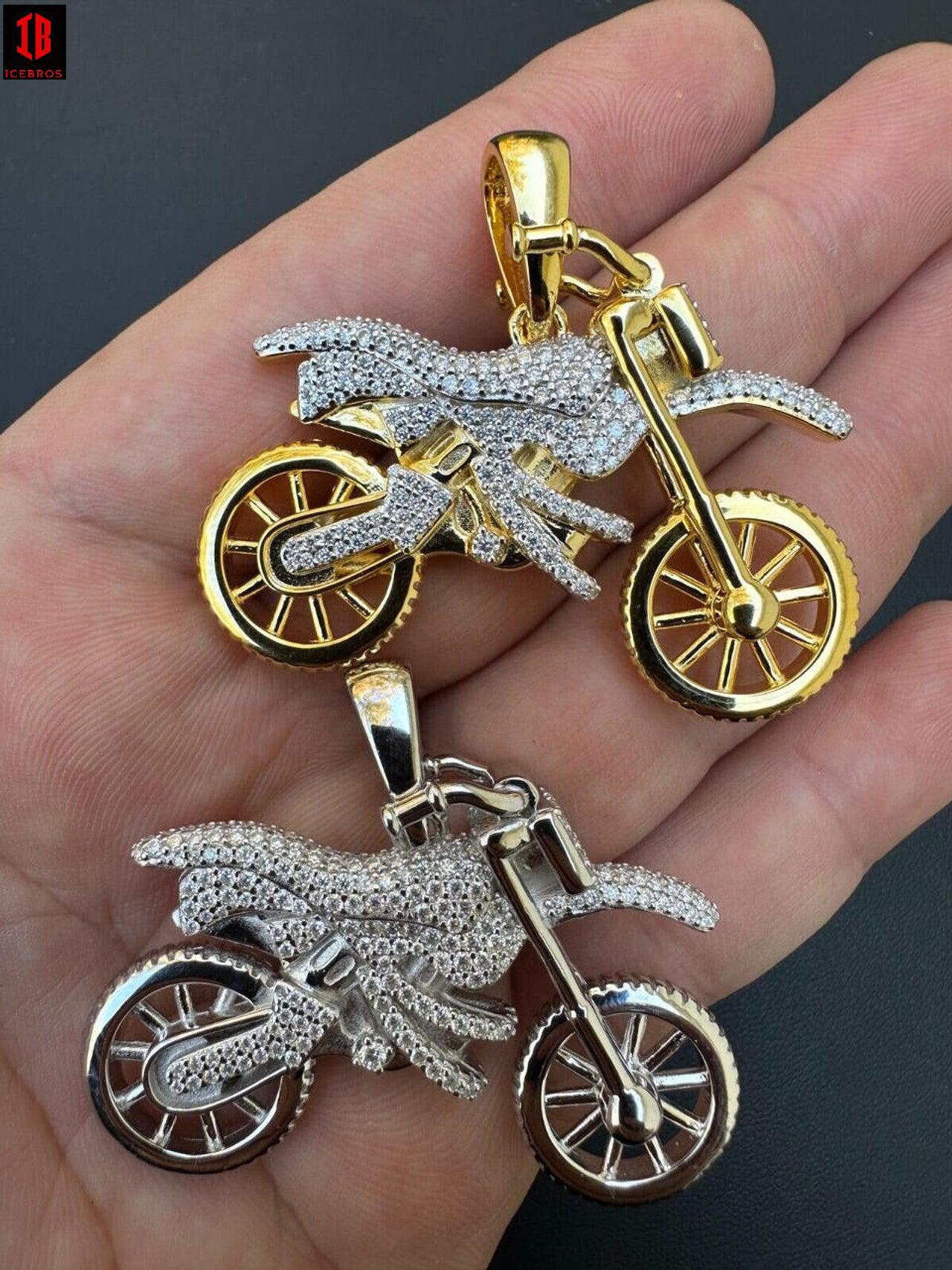 Men Showing Detailed View of  14k White And Yellow Gold Dirt Bike  Pendant Necklace With Flawless Round Cut Moissanite  On the Body Of Bike 