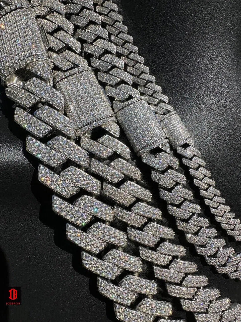 Close-up view of a White Gold Cuban Link Chain, showcasing its intricate links and luxurious shine