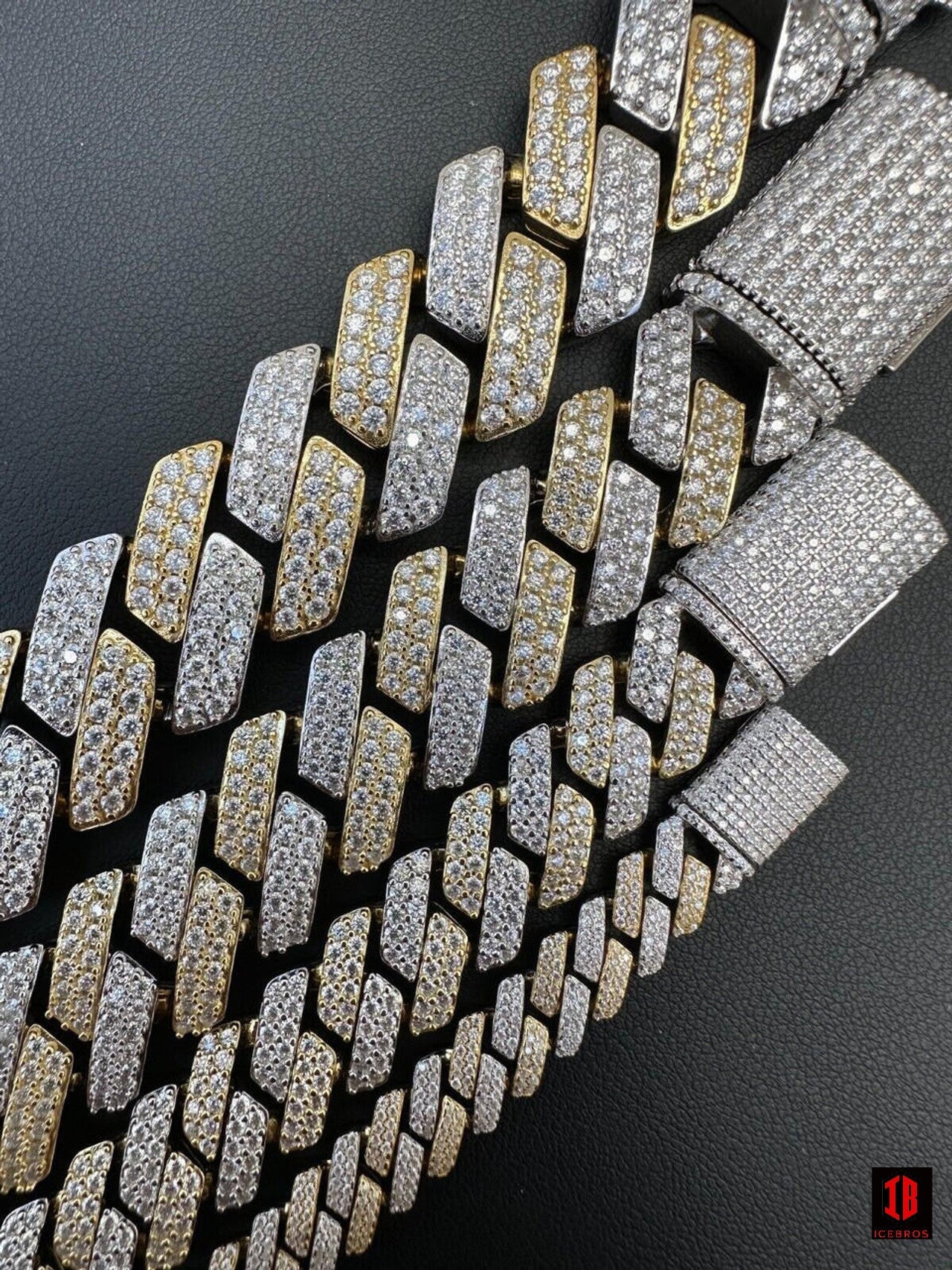 Close-up view of a 14k Yellow & White Gold Diamond Moissanite Miami Cuban Link Bracelet, elegantly draped across a diverse range of wrist sizes. The bracelet sparkles in the light, showcasing its intricate design and luxurious materials