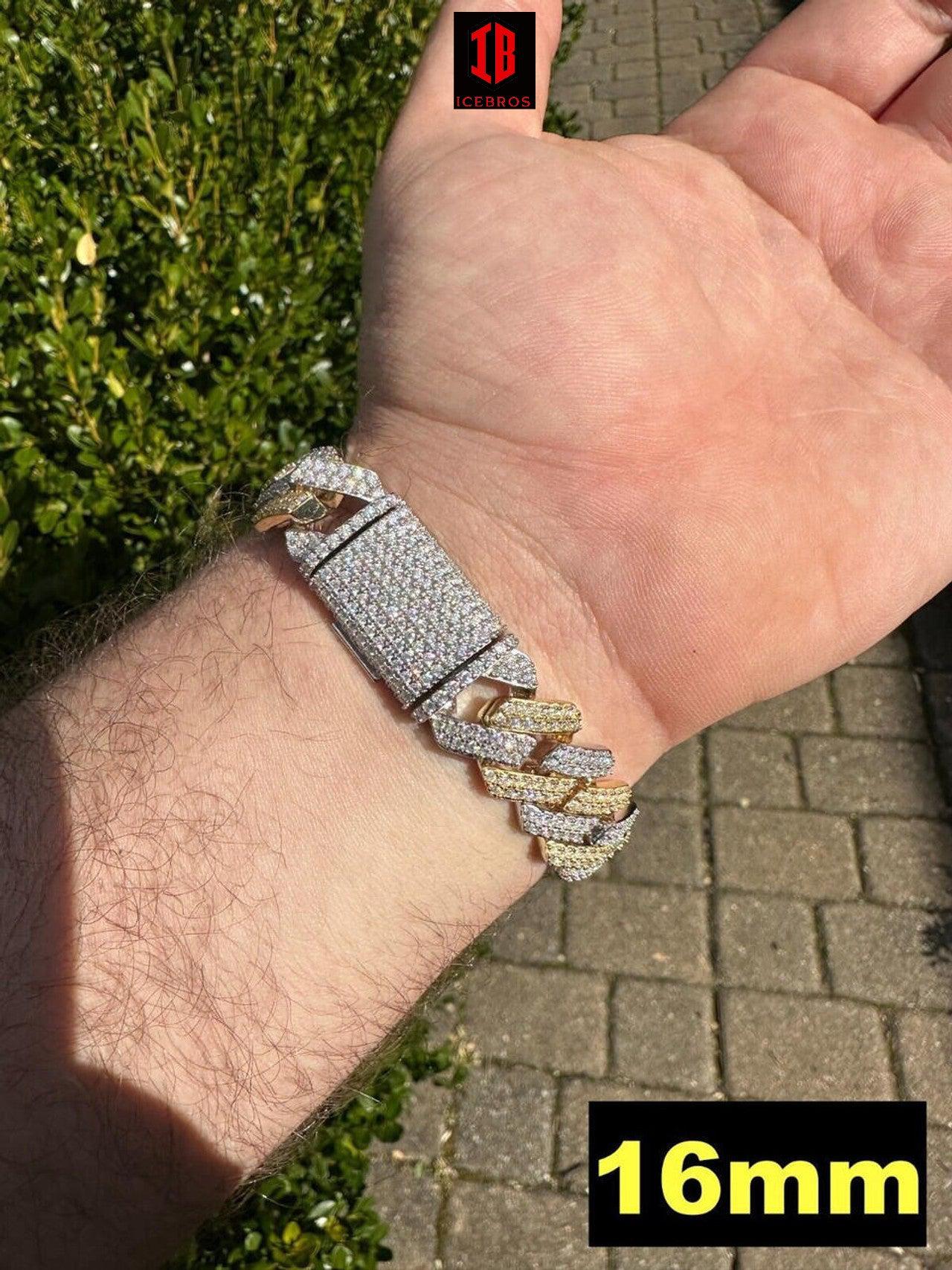 Close-up view of a men's hand model wearing a 14k Yellow & White Gold Two-Tone Miami Cuban Link Bracelet.