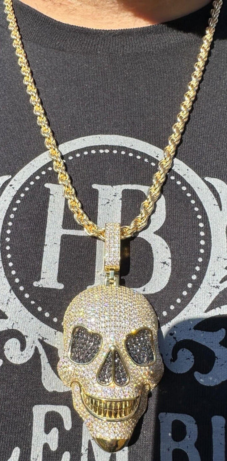 A Men Wearing Large 3D 14k Gold Skull Pendant Necklace with 14k Gold Rope Chain 
