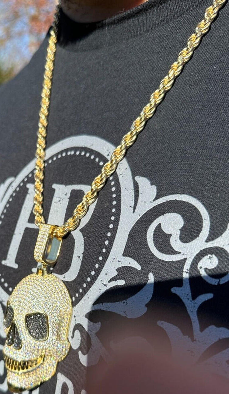 A Side View Of 14k Gold 3D Skull Pendant with 14k Gold Rope Chain Necklace 